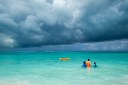 A gathering storm on Grace Bay Beach in Turks and Caicos islands in the Caribbean.