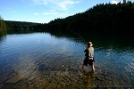 Chris casts his fly line into the&nbsp;river.