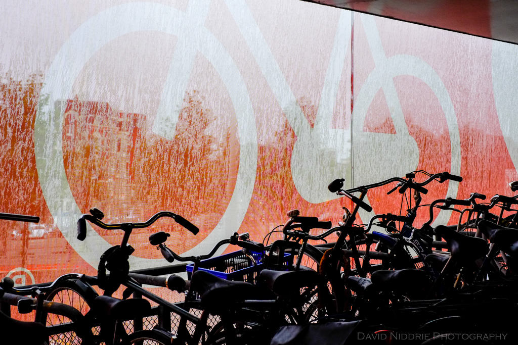 Rain drops on the sin for bicycle parking in Amsterdam.