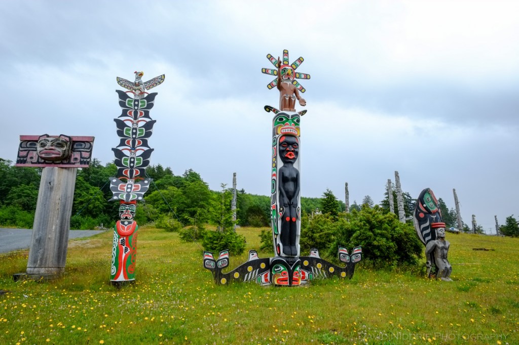 Totem poles stand tall at the traditional Namgis Burial Grounds on Alert Bay