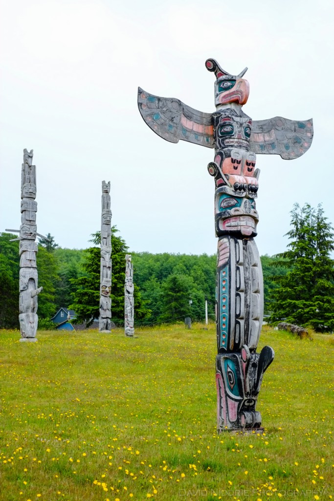 Totem poles stand tall at the traditional Namgis Burial Grounds on Alert Bay